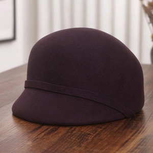 Close-up of deep purple wool felt equestrian hat with crystal wheat ear detailing
