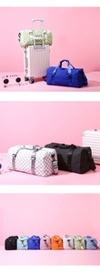 Macro detail of checkered travel bags in various colors with adjustable shoulder straps