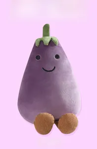 Close-up of purple plush eggplant with green leaf top and striped corduroy feet