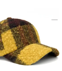 Detail of multi-color fuzzy lamb wool baseball cap with wide foldable brim for winter