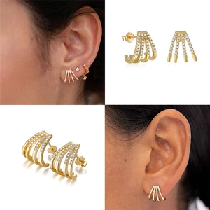 Detail of S925 sterling silver four-row curved stud earrings with white zircon accents
