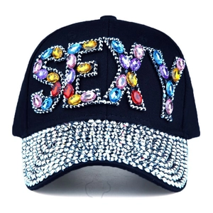 Detail of colorful SEXY crystal letters and rhinestone brim on black baseball cap