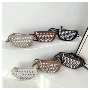 Detailed arrangement of crescent crossbody bags with silver rivets in five assorted colors