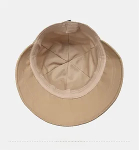 Detail view of khaki sun hat interior featuring breathable fabric and sweatband construction