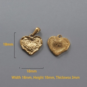 Detailed view of 18k gold plated heart pendants with molten texture and 18mm dimensions