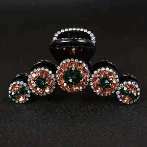 Pinza per capelli con strass verdi e arancioni per acconciature eleganti da donna