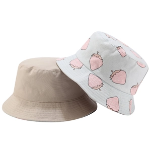 Reversible canvas bucket hat with cute strawberry print and khaki solid side for sun protection