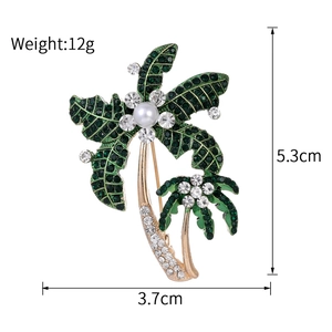 Golden coconut tree brooch with green crystals and pearl, 5.3cm x 3.7cm size