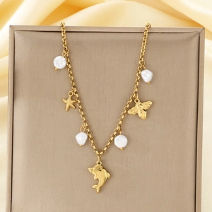 Golden stainless steel beach necklace with sea star, dolphin, bee charms and pearls