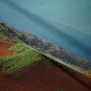 Detailed view of bohemian wall tapestry with digital landscape print and soft fabric texture