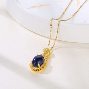 Thermosensitive water drop necklace with blue color-changing stone and zircon halo
