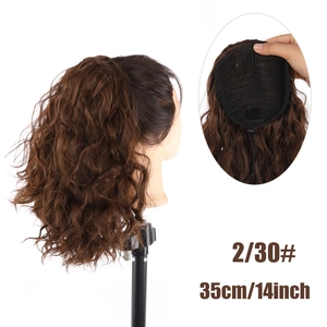 Internal net structure and drawstring clip detail of a 14-inch wavy ponytail hair extension