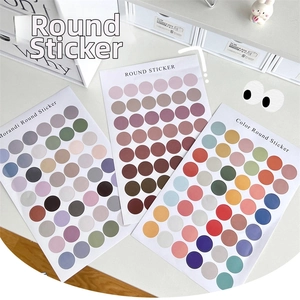 Close-up of Morandi colored round dot stickers for journals and scrapbooking decorations