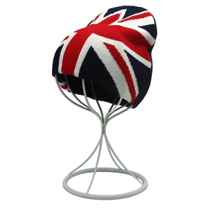 Close-up of Union Jack flag pattern on a knitted beanie showing red blue white textures