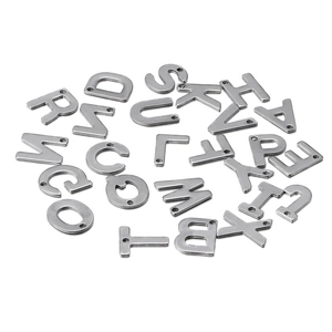 Macro shot of silver stainless steel A-Z letter charms for DIY jewelry making