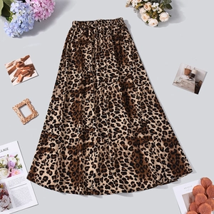 Detailed view of leopard print long skirt featuring elastic high waist and soft texture