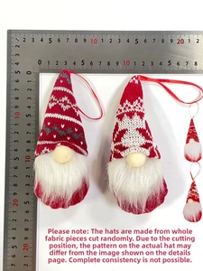 Detailed view of Christmas gnomes ornaments on a scale ruler showing size measurements