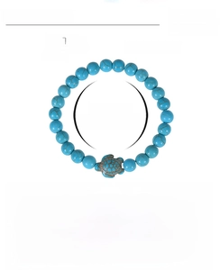 Detail view of turquoise beaded turtle bracelet with 8mm stones and size specifications