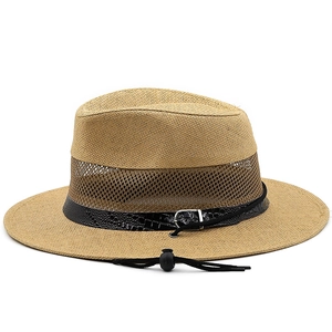Detail of breathable mesh weave and faux leather band with metal buckle on straw hat