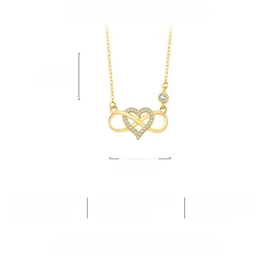 Macro detail of 925 silver heart and infinity pendant necklace with zircon stones