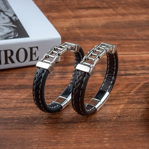 Men's set of black and dark brown braided leather bracelets with silver bicycle chain links