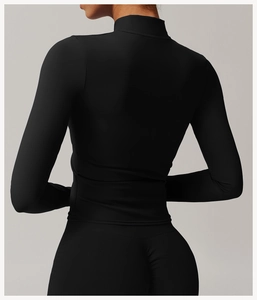 Rear view of a black slim fit sports jacket showing the breathable fabric and athletic cut