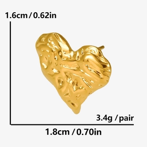 Detail view of heart-shaped gold studs showing 1.6cm height and 1.8cm width dimensions