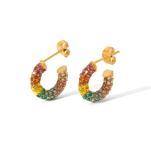 Macro shot of 18K gold plated C-shaped earrings with colorful rainbow pavé crystals