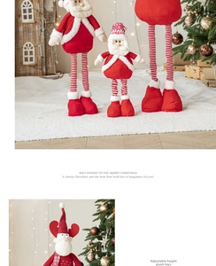 Close-up of adjustable telescopic legs on red Christmas fabric snowman and Santa dolls