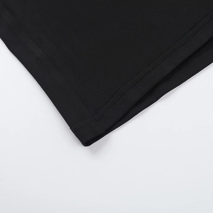 Close-up of double-needle stitching and fabric texture on a black strapless dress