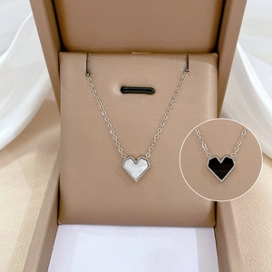 Minimalist heart pendant necklace with white mother of pearl and beaded edge on silk