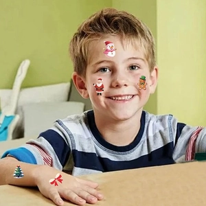 Colorful Christmas temporary tattoos for kids with Santa, snowman and gingerbread designs