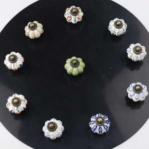 European pumpkin pattern ceramic cabinet knobs set in vintage bronze finish