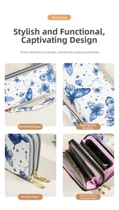 Detail of leather wristlet wallet with blue butterfly print and dual zipper pockets