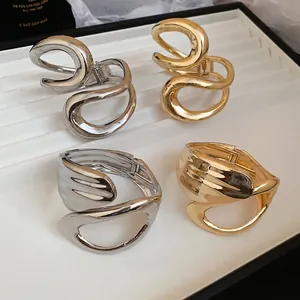 Minimalist irregular geometric hollow crossover open bangles in gold and silver finish