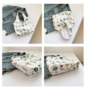 Detail view of white canvas tote bag with colorful floral patterns from multiple angles