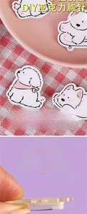 Detailed macro view showing the 4mm thickness of the cute acrylic puppy brooch and its texture