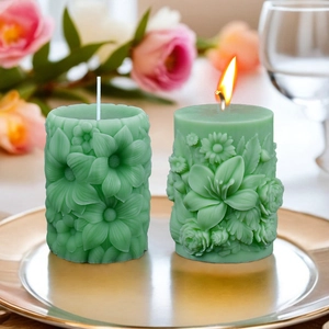 Cilindrische aromatherapie kaarsen met elegant lelie-reliëf in lichtgroene kleur