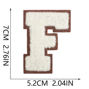 Macro detail of 7cm chenille letter F patch in cream and brown with size measurements