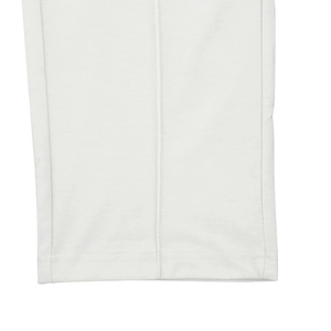 Detailed close-up of premium white fabric showing high-quality stitching and fine texture