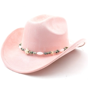 Pink suede cowboy hat detail featuring ethnic style beads and turquoise pendants