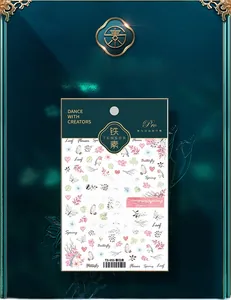 Détail de stickers à ongles 5D aux motifs de fleurs printanières et papillons