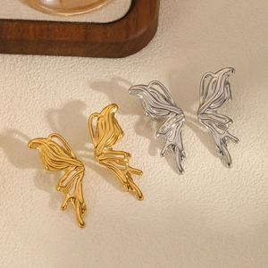 Minimalist Y2K butterfly wing stud earrings in liquid gold and silver metallic finish
