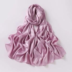 Detail of soft purple chiffon shawl with elegant silk texture and fluid drape effects