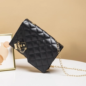 Elegant black quilted PU leather crossbody bag with golden chain strap and metal lock