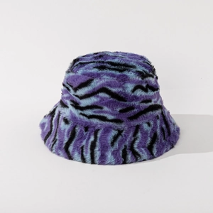 Close-up of fuzzy purple and blue tiger striped pattern on plush faux fur bucket hat