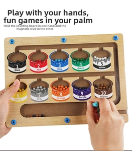 Close-up of wooden magnetic color and number maze toy with stylus for early learning