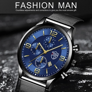 Detailed side view of luxury blue dial watch with date display and black mesh band