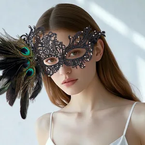 Venetian style black lace mask with gradient peacock feathers and pearl detailing
