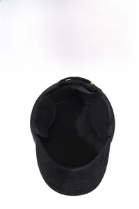 Close-up of black winter ear flap cap for elderly men with warm thermal lining detail